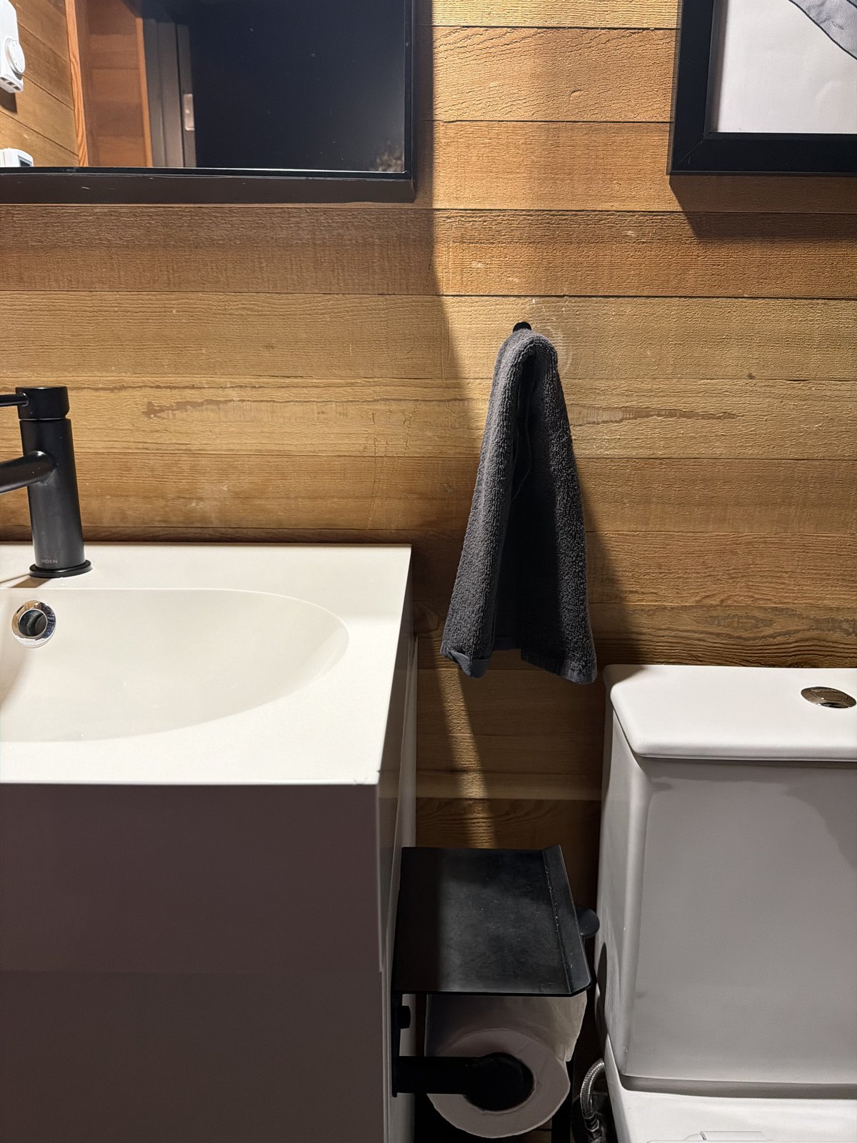 Clean bathroom with tub and toilet